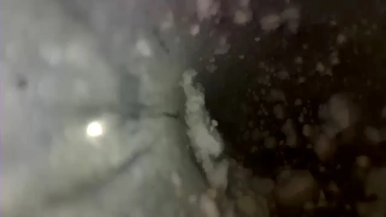 Inspection camera view of thick debris accumulation inside a circular air duct